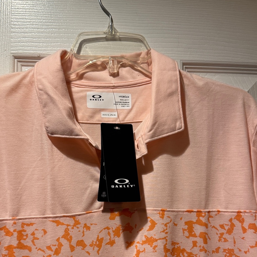 Oakley Peach Polo with Orange Graphic Band